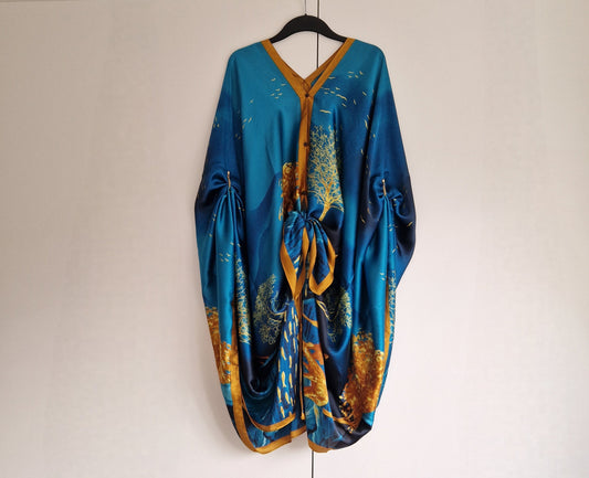 Handmade Boho-style multi-wear kaftan and a blue robe with a golden border, and with botanical, made from a soft cotton-polyester blend