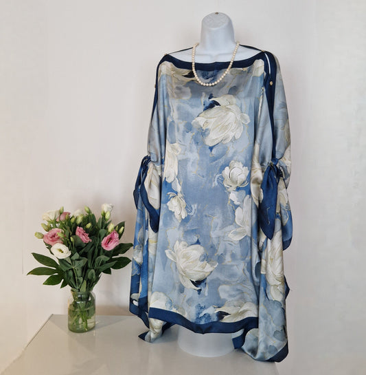 Handmade Boho-style multi-wear kaftan featuring a champagne robe and a blue border, crafted from a soft cotton-polyester blend.