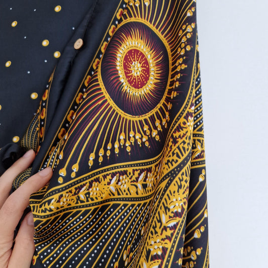 Handmade Boho-style multi-wear kaftan,  black robe and gold details  with botanical, made from a soft cotton-polyester blend