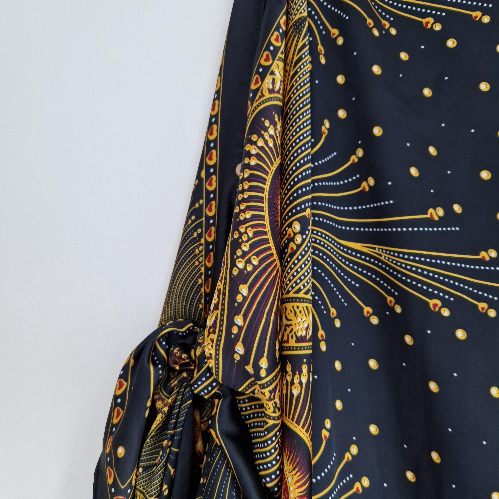 Handmade Boho-style multi-wear kaftan,  black robe and gold details  with botanical, made from a soft cotton-polyester blend