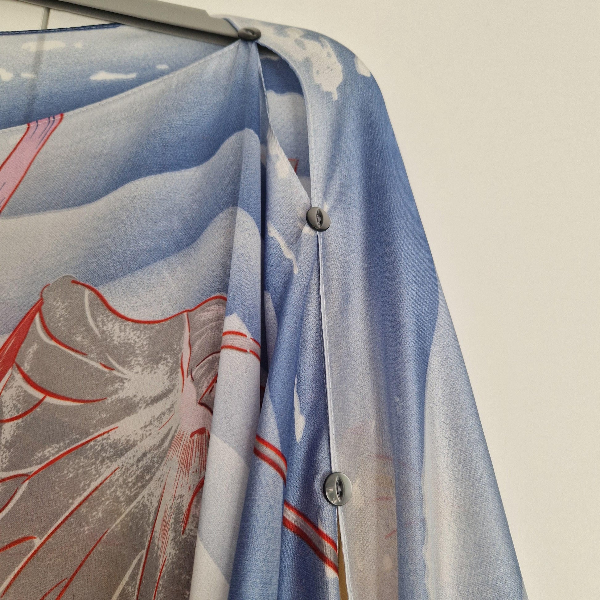 Handmade Boho-style multi-wear kaftan. Coloured with a lotus flower and blue waves coloured robe, with botanical, made from a soft cotton-polyester blend
