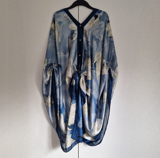 Handmade Boho-style multi-wear kaftan featuring a champagne robe and a blue border, crafted from a soft cotton-polyester blend.