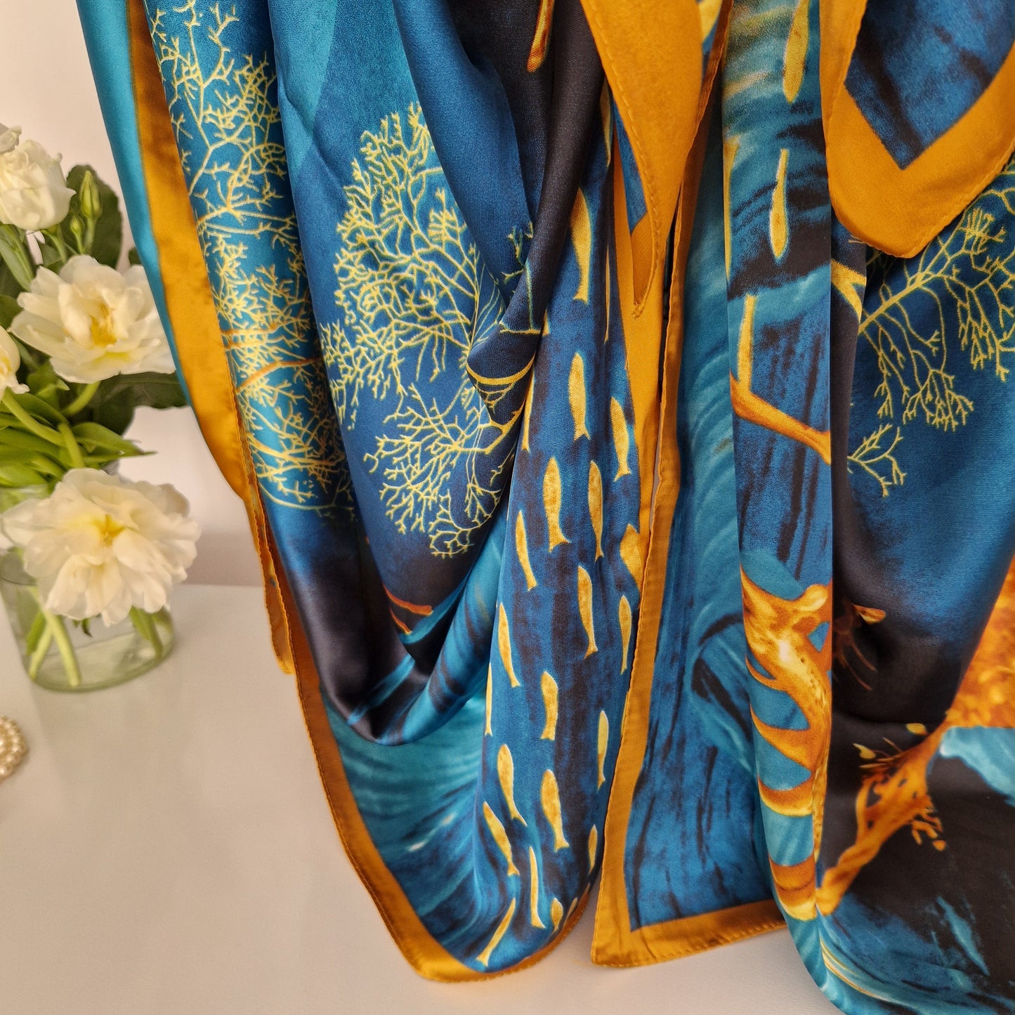 Handmade Boho-style multi-wear kaftan and a blue robe with a golden border, and with botanical, made from a soft cotton-polyester blend