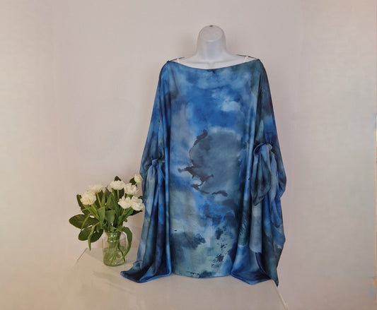 Handmade Boho-style multi-wear kaftan and robe in turquoise with botanical cherry blossom print, made from a soft cotton-polyester blend