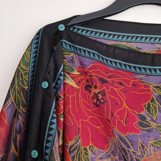 Handmade Boho-style multi-wear kaftan and a multi coloured warm coloured robe, with botanical, made from a soft cotton-polyester blend